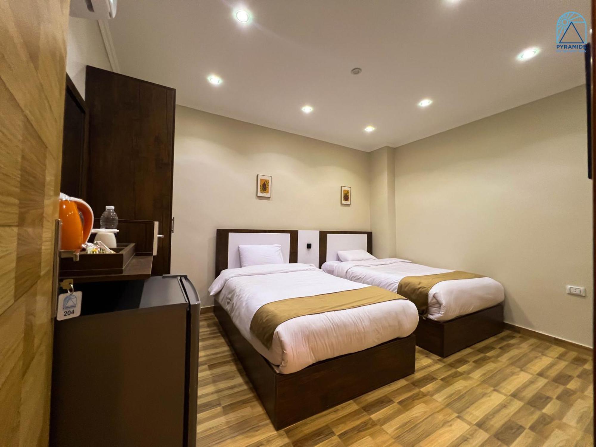 Hotel Pyramids On The Spot View Kafret el-Gabal Exterior foto